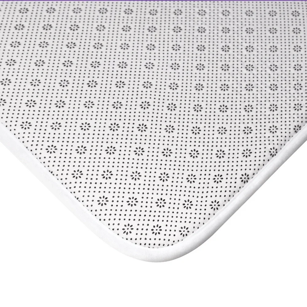 Bath mat, coordinates with Confident Queen shower curtain